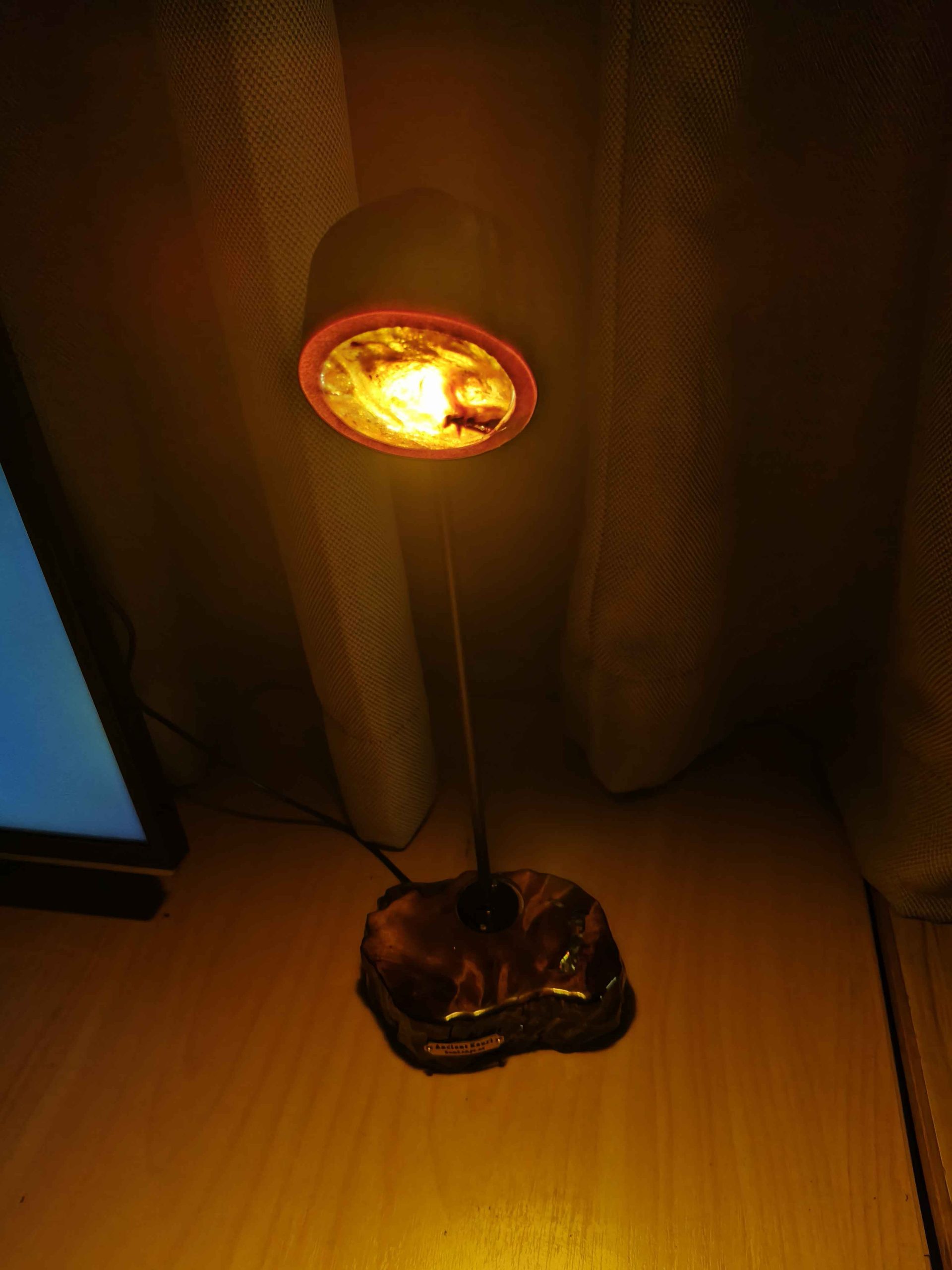 Stunning lit upSwamp kauri Amber desk lamp with a plaque and Paua embelishment