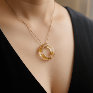 Wearing a gumlamps, kauri gum amberstone ring necklace on a chain